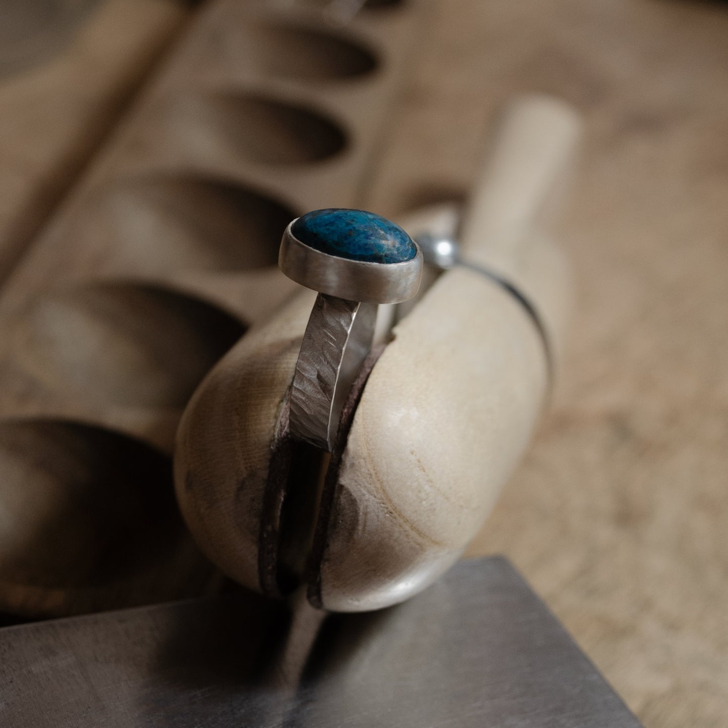 Textured band ring with cabochon-set chrysocolla