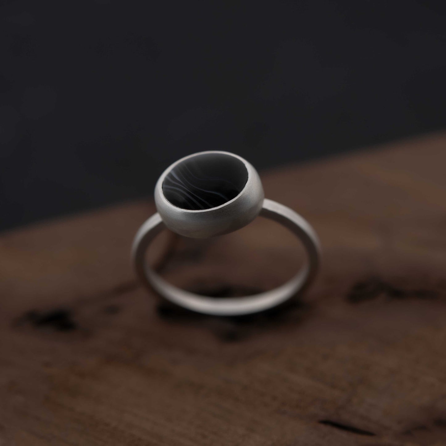 Exquisite silver ring with natural black banded agate stone