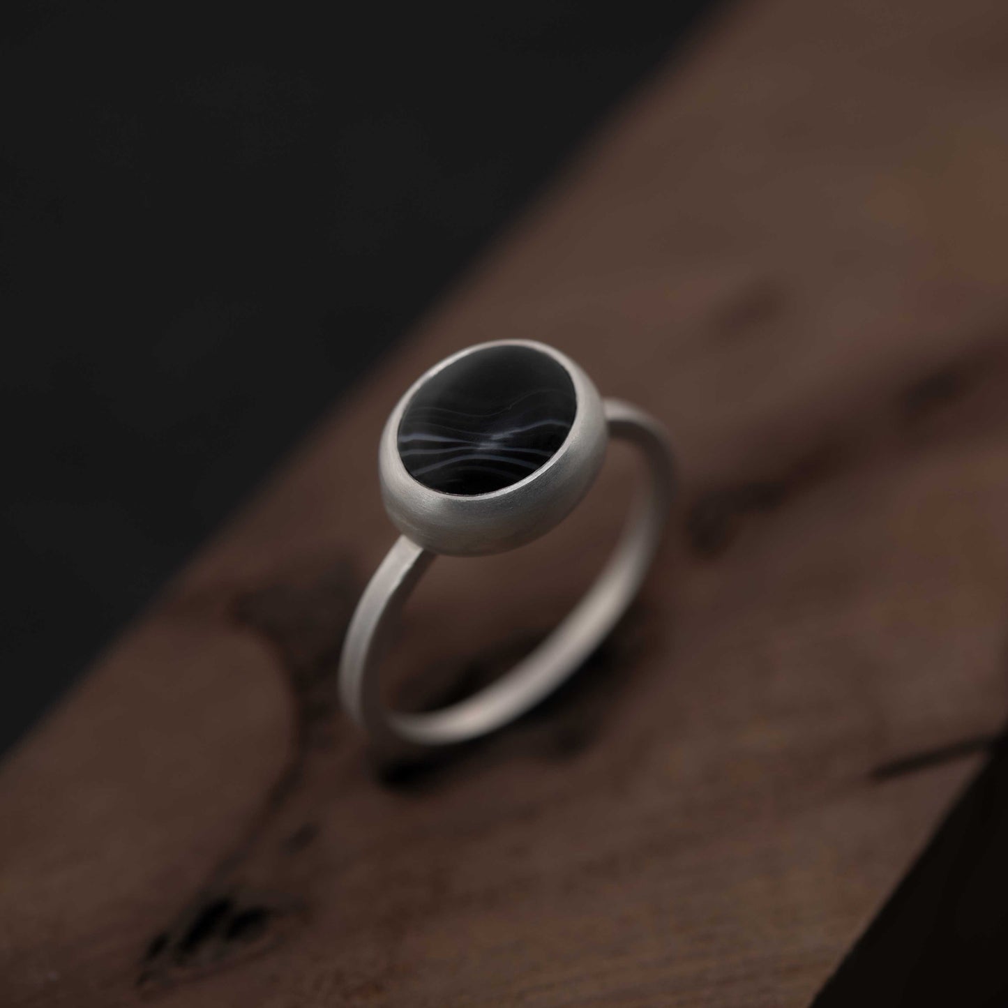 Exquisite silver ring with natural black banded agate stone