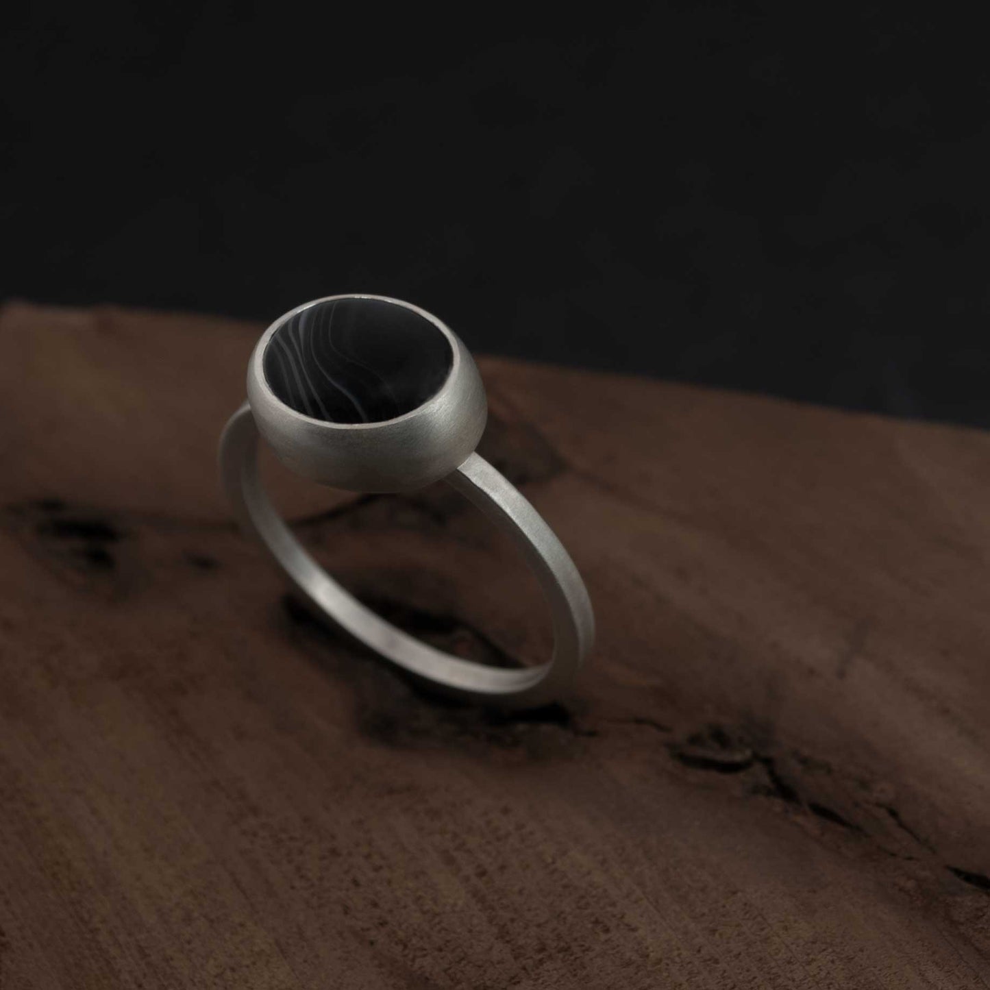 Exquisite silver ring with natural black banded agate stone