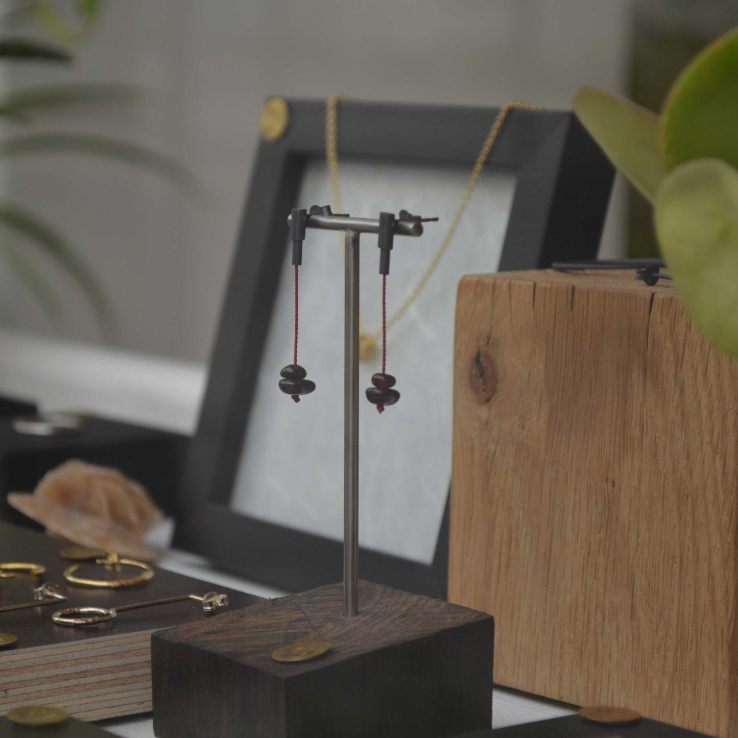 Garnet stone dangle earrings in oxidized silver with red silk cord