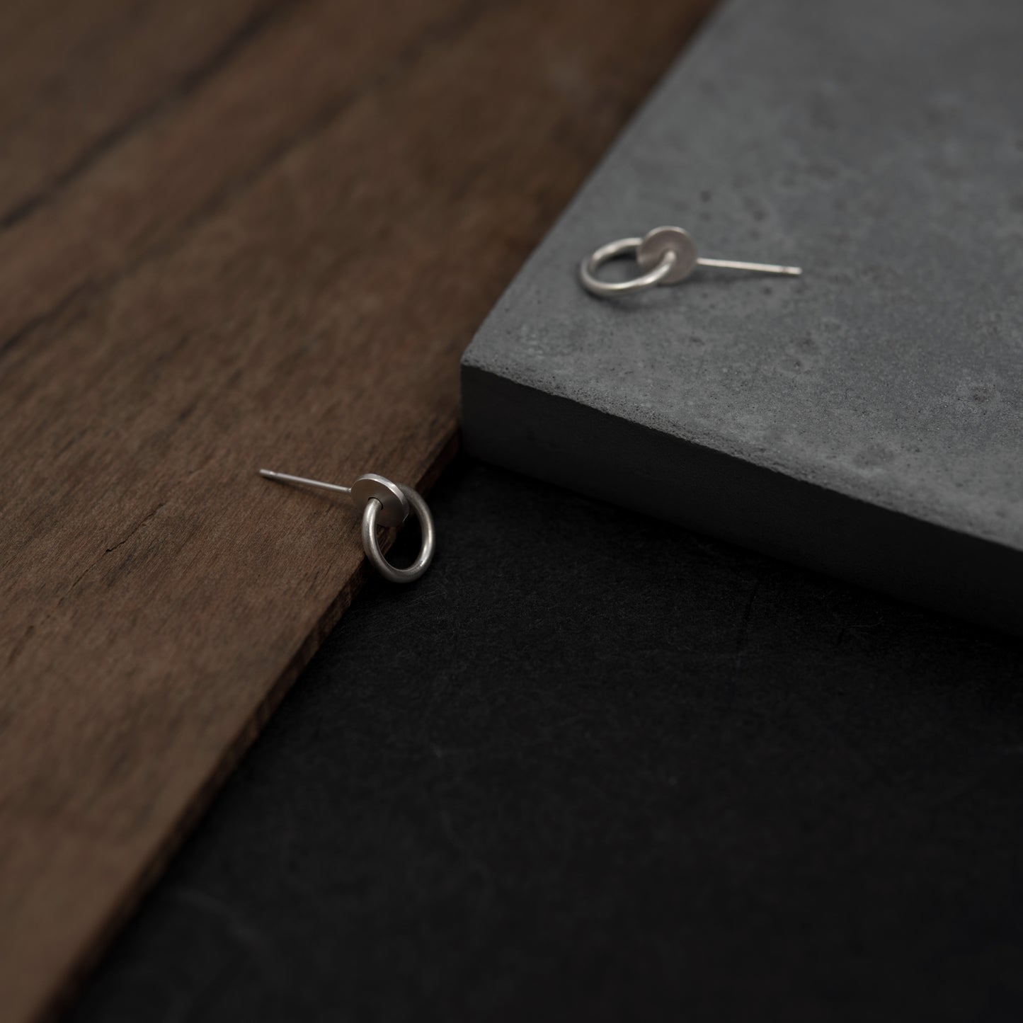 Close up of circle dot stud handmade by AgJc