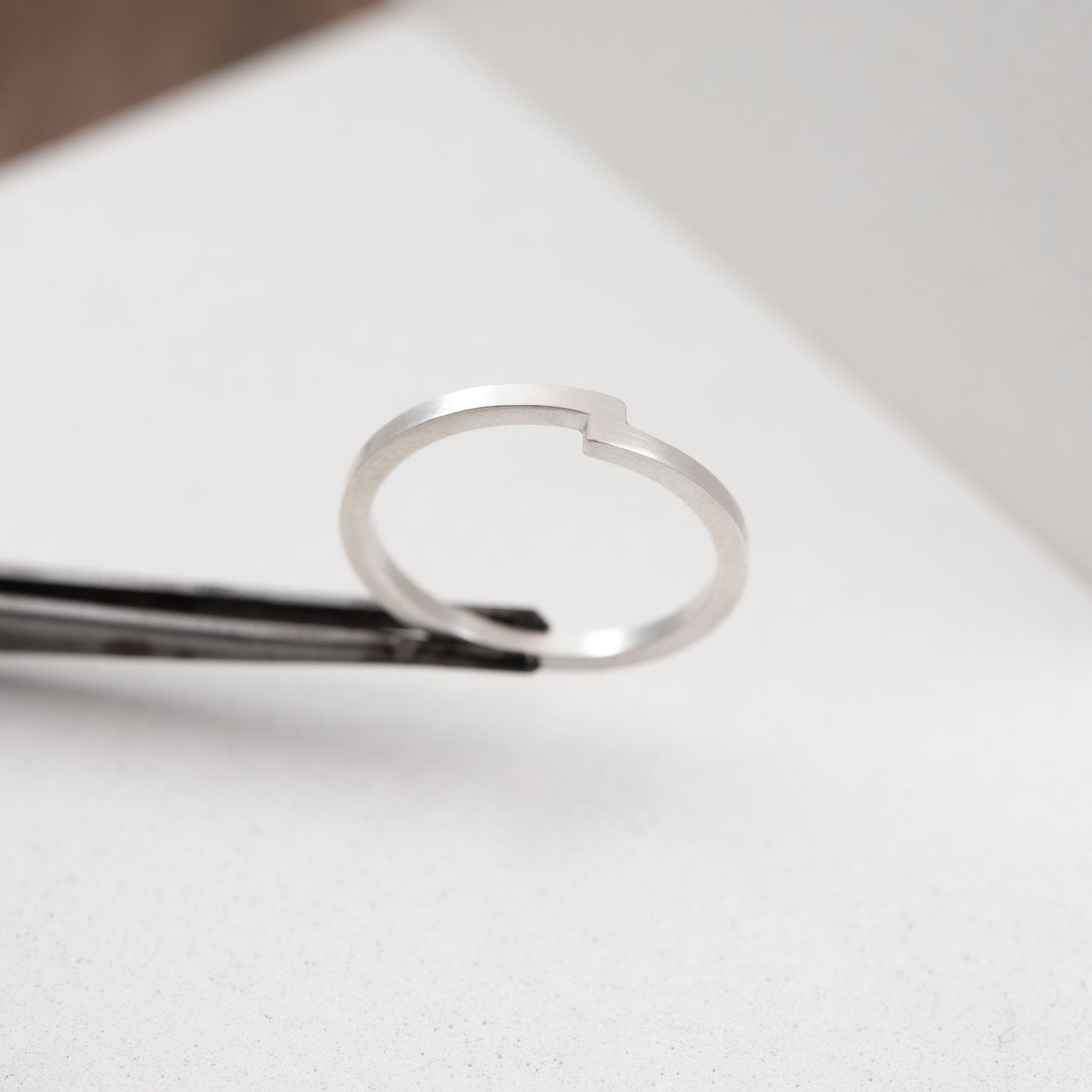 Square band ring, crafted by hand from a 1,5 mm square shape band of solid sterling silver. A classic design with a twist that made this thin band ring simple and yet modern! Designed by a g j c