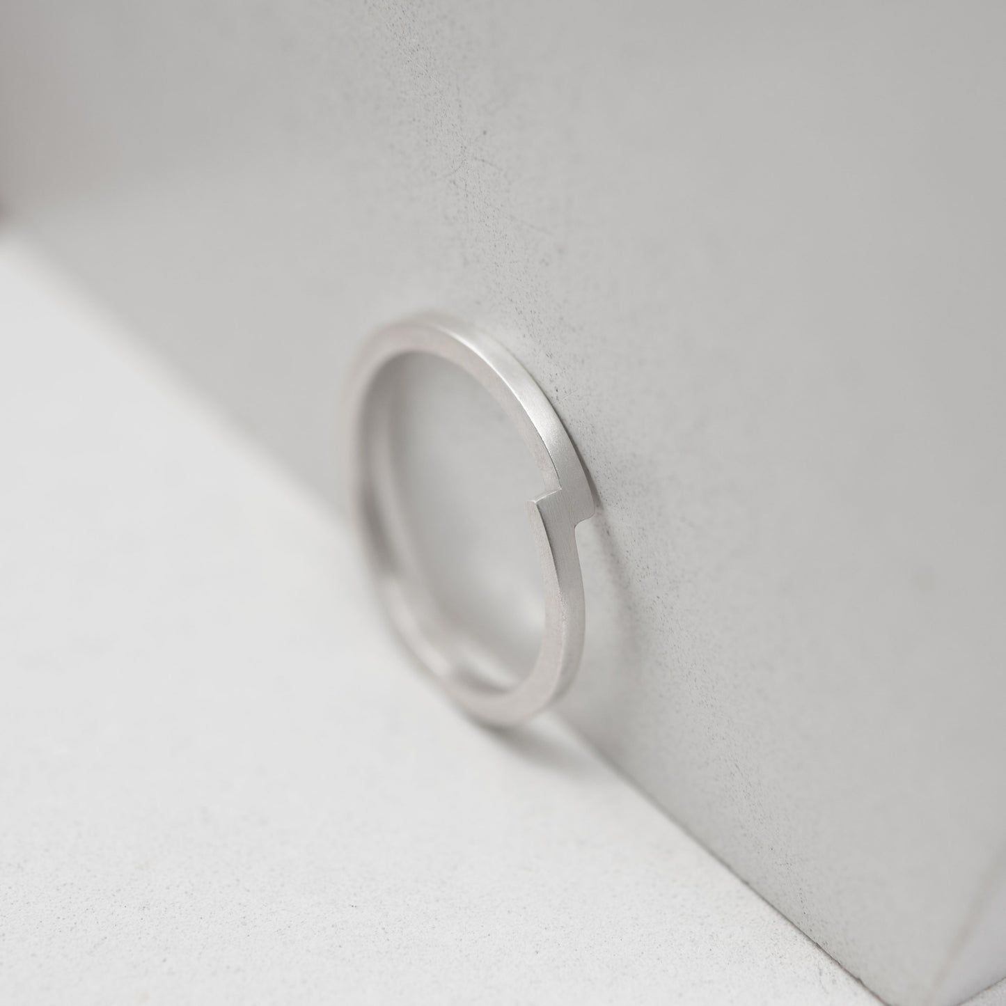 Thin band silver ring. Crafted by hand by a g j c from a 1,5 mm square shape band of solid sterling silver.