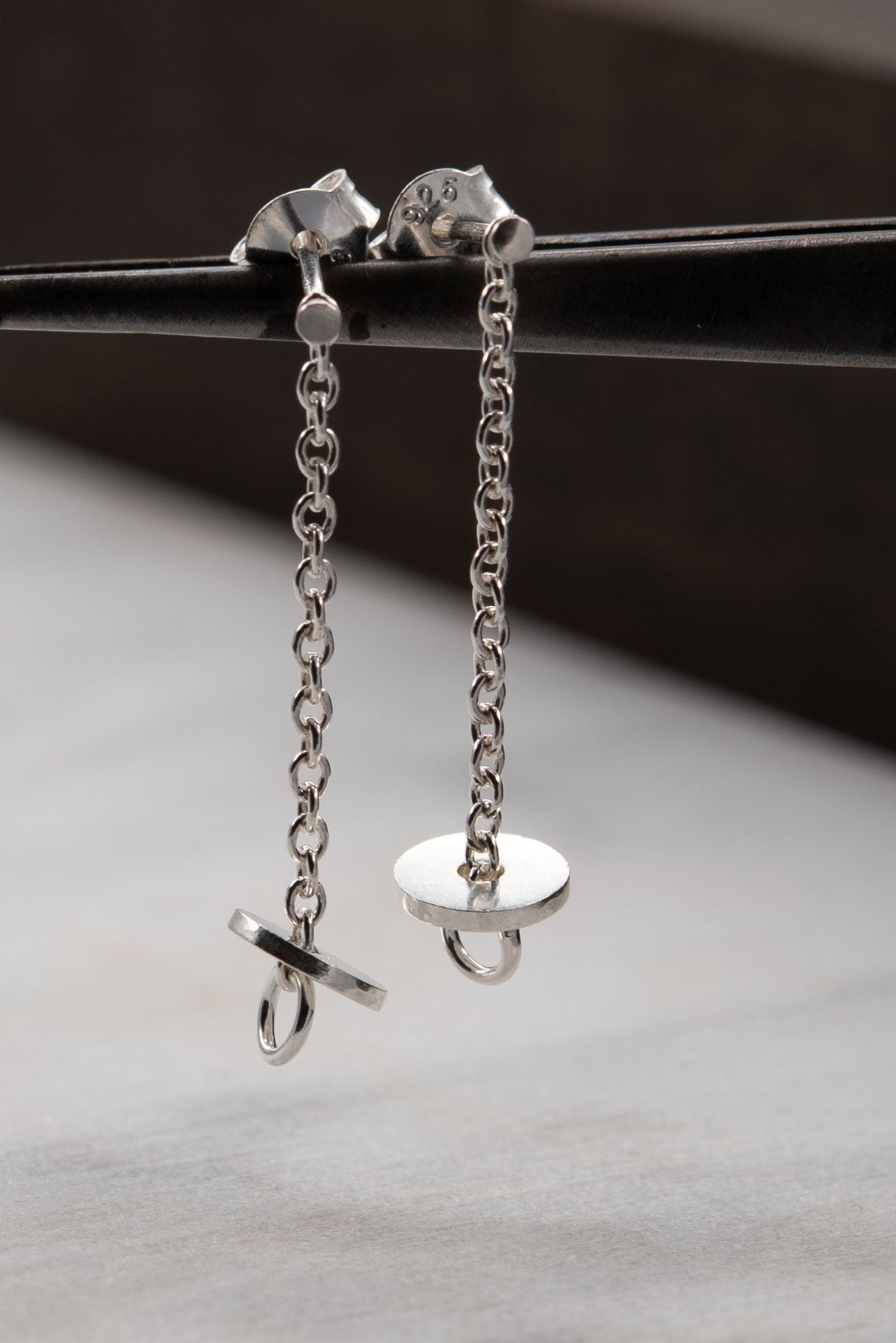 Short silver chain earrings with disc pendants